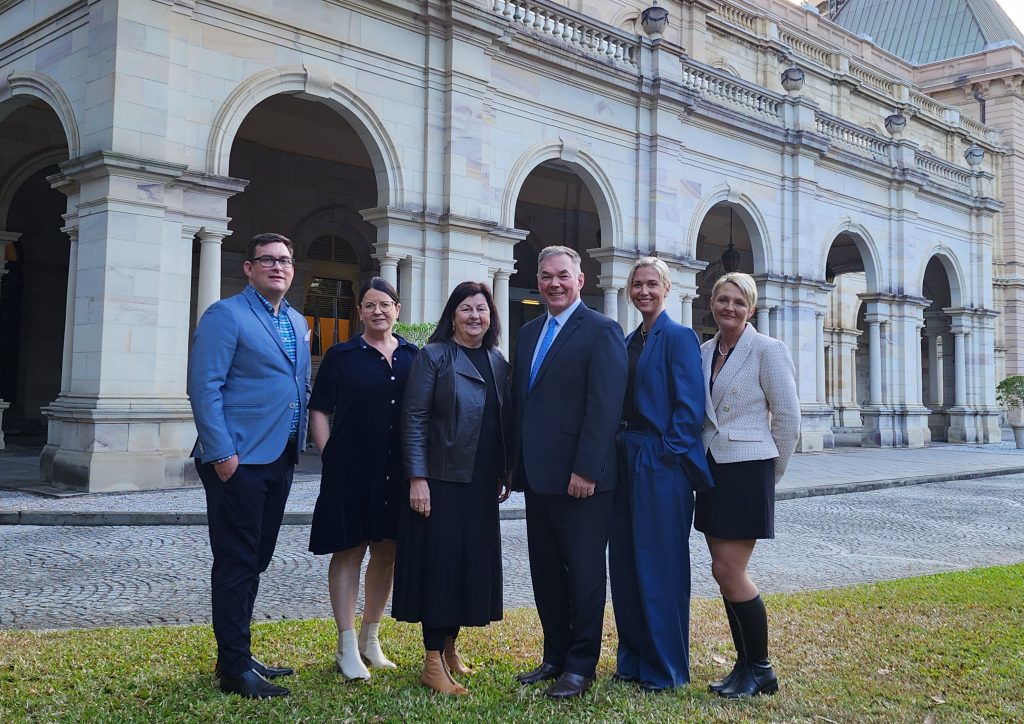 L-R: Isaac Regional Council Director of Planning, Environment and Community Services Dan Wagner, Councillor Gina Lacey, Mayor Anne Baker, Minister for Resources Scott Stewart, Deputy Mayor Kelly Vea Vea and long-term Glenden resident Milissa Phillips-Payne outside Queensland Parliament in Brisbane on 24 August 2023.